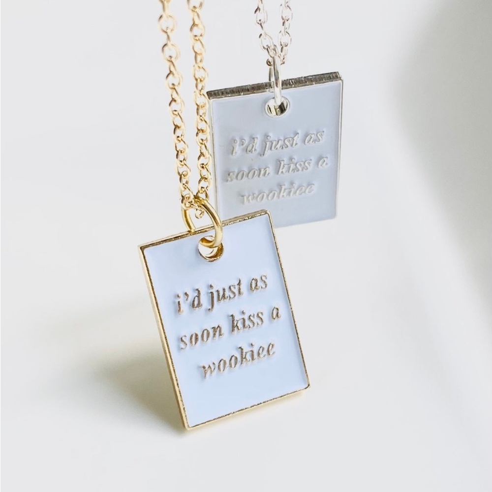 Star Wars Inspired “Kiss a Wookiee” Enamel Quote Pendant Necklace Color: Gold